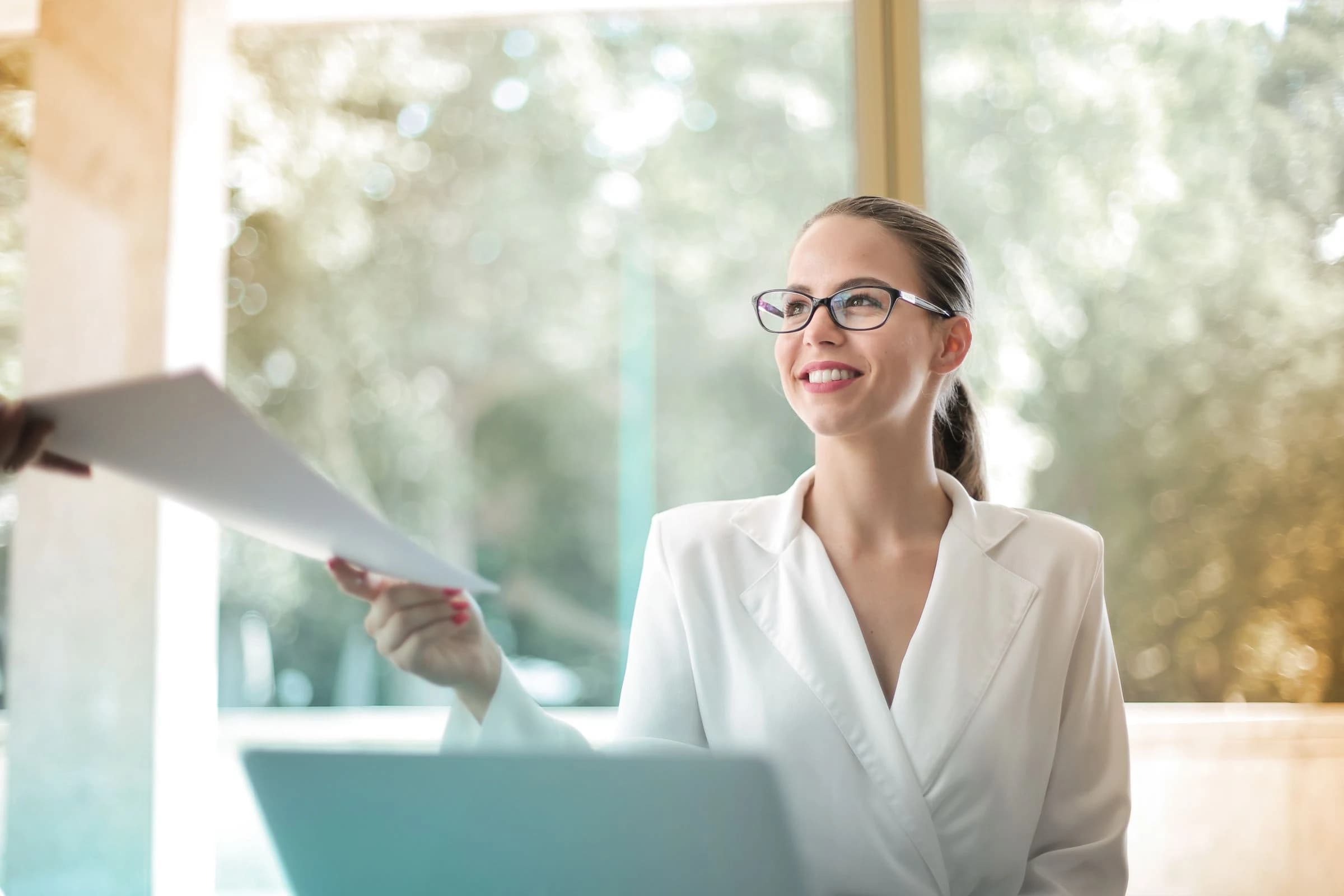 A professional reviewing the details of her work
